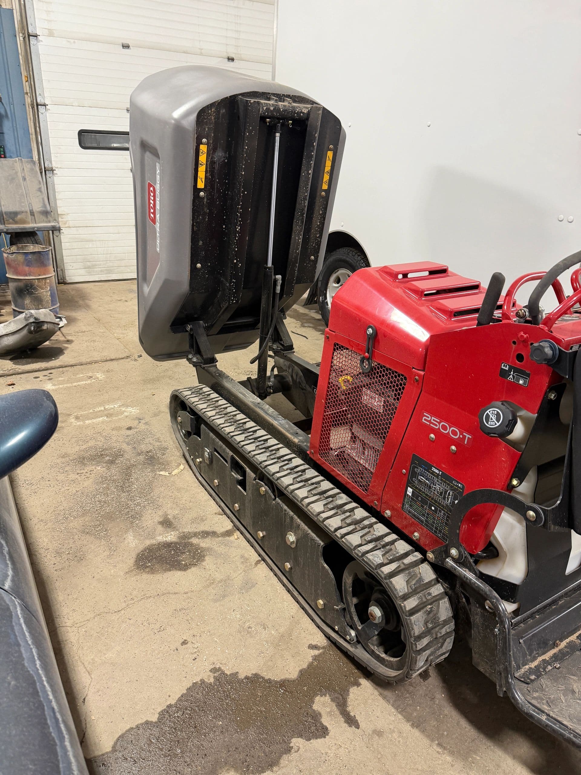 Mini excavator digging a trench